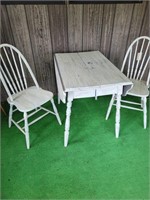 White chippy table and 2 chairs
