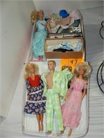 BARBIES AND KEN WITH DOLL CASE AND ACCESSORIES