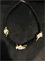 Necklace with black glass beads pink coral and