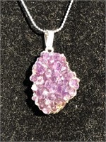 Amethyst crystal necklace on silver chain