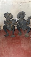 Metal frogs playing music outdoor decor