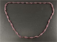 Polished garnet bead necklace with unique beading