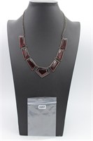 Red bezel set gem necklace