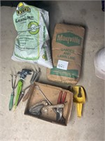 Gardening lime, sprinkler head, and garden tools