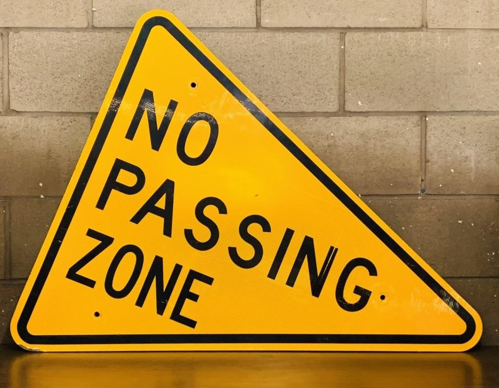 no passing zone sign