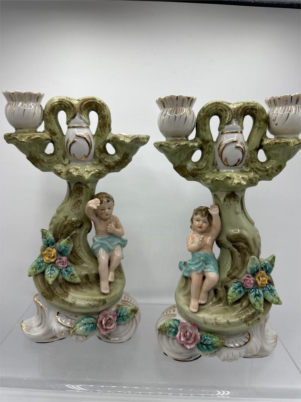 Vintage cherub candlestick holders