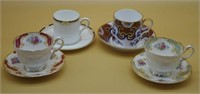 Four coffee cups and saucers