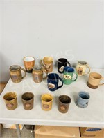 14 pottery beer mugs, Stampede & Western theme
