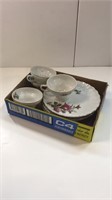 Set of 4 cups and saucers