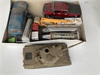 Toy trucks, cars and tanks