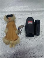 doll and monocular