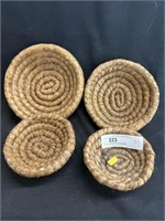 Four Graduated Rye Straw Baskets