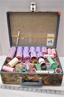 Small decoupage suitcase of vintage rollers