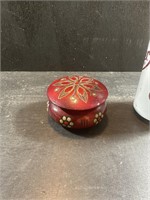 Carved round wooden box with lid
