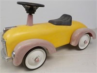 Toy riding car metal frame with plastic parts.