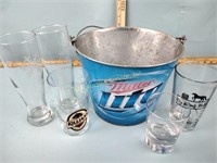 Drinking glasses and Miller lite bucket