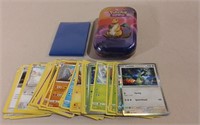 50+ Pokémon Cards W/ 50 Sleeves & Tin No Doubles