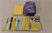 50 Pokémon Cards W/ 20 Sleeves & Tin No Doubles