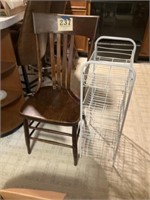 Wooden chair with damage, and
White wire rack