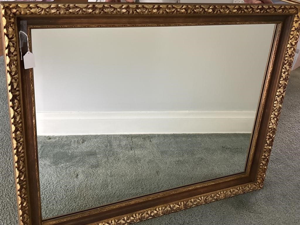 Large, gold tone, framed mirror 46x36