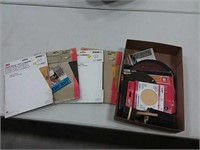assortment of sand paper and disc's