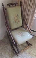 Vintage rocking chair with needlepoint