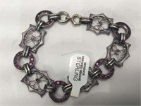 Sterling Silver bracelet with purple stones -