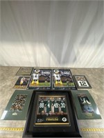 Assortment of Packer prints, photos, posters, and