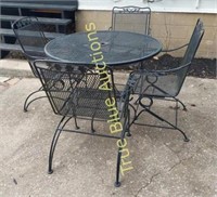 Wrought Iron Outdoor Table And Four Chairs