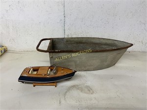 2 BOATS (1 METAL OTHER IS WOOD AND METAL)