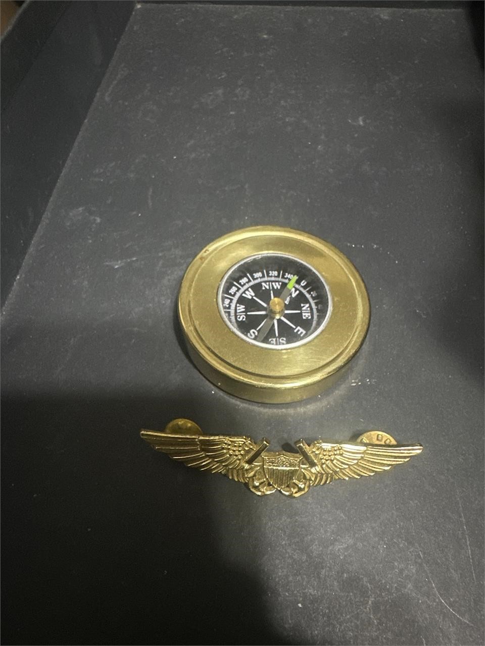 Vintage working brass compass and military pin