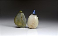 TWO CHINESE PEBBLE JADE SNUFF BOTTLES