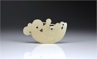 CHINESE JADE CARVED PENDANT OF FIGURE ON A FISH
