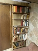BOOK SHELVES WITH BOOKS