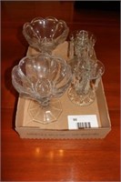 2 candle holders and 2 candy dishes