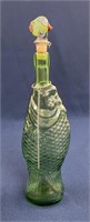 Vintage green glass wine decanter with fish