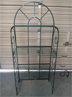 Metal gardening shelves.