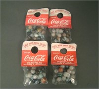 4 bags of Coca Cola Marbles in Original Packages