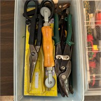 Box of misc nippers, pliers, wire cutters.