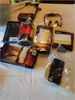 Box of phone cases and chargers