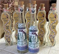 E - LOT OF 7 BOTTLES (F34)