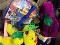 tote with Barney dolls and chidrens toys
