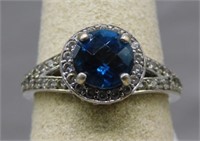 Sterling Silver CZ blue stone ring, size 7.