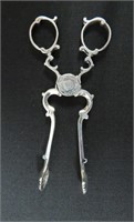 Pair of 18th century sterling sugar nips, 4 3/4" l