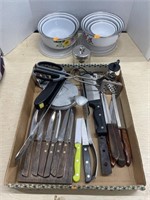 Metal bowls, kitchen knives and utensils