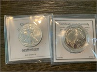 (2) Silver Dollars