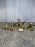Assortment of gold painted trophies