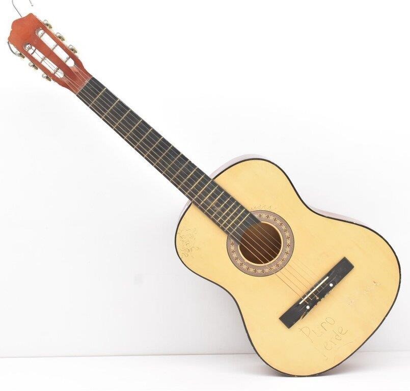 Six String Acoustic Guitar