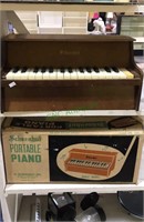 Schoenhut kids piano with the original box, plays