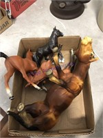 Plastic horses--foot missing on one